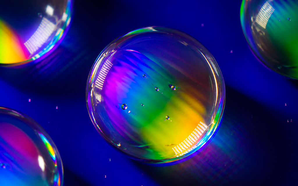 Water drops being irradiated with light.