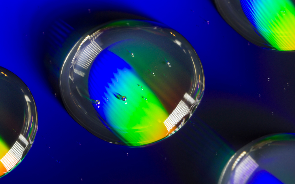 Water drops being irradiated with light.